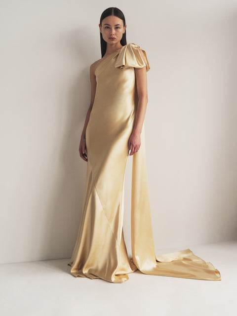 One Shoulder Bow Gown with Train in Dark Champagne